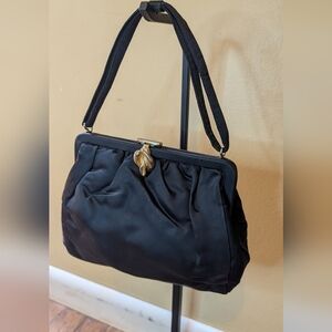 Vintage Chic Black Clutch with Gold Accent Snap